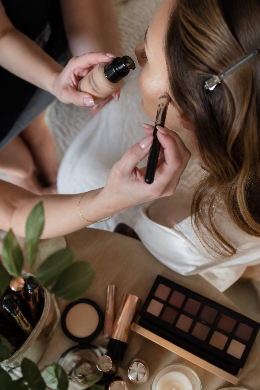 Makeup products including Armani foundation and Charlotte Tilbury Flawless Filter.
