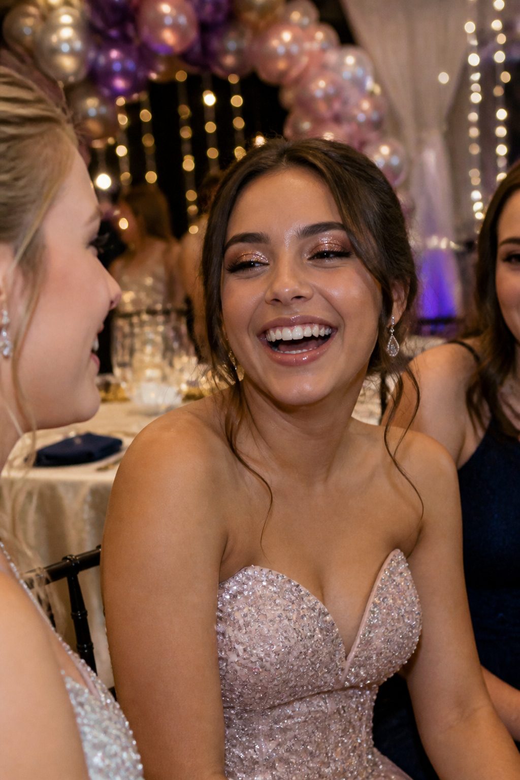 Close-up of young woman with glittery eye makeup at prom.