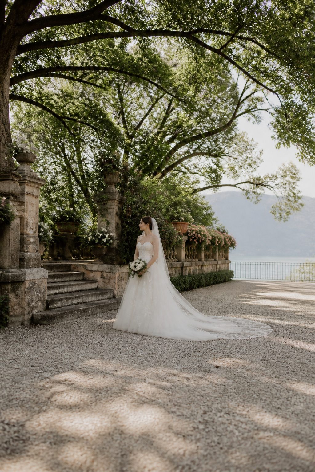 20 Wedding Photos Ideas for 2026 6 Bride in her wedding dress posing in natural light.