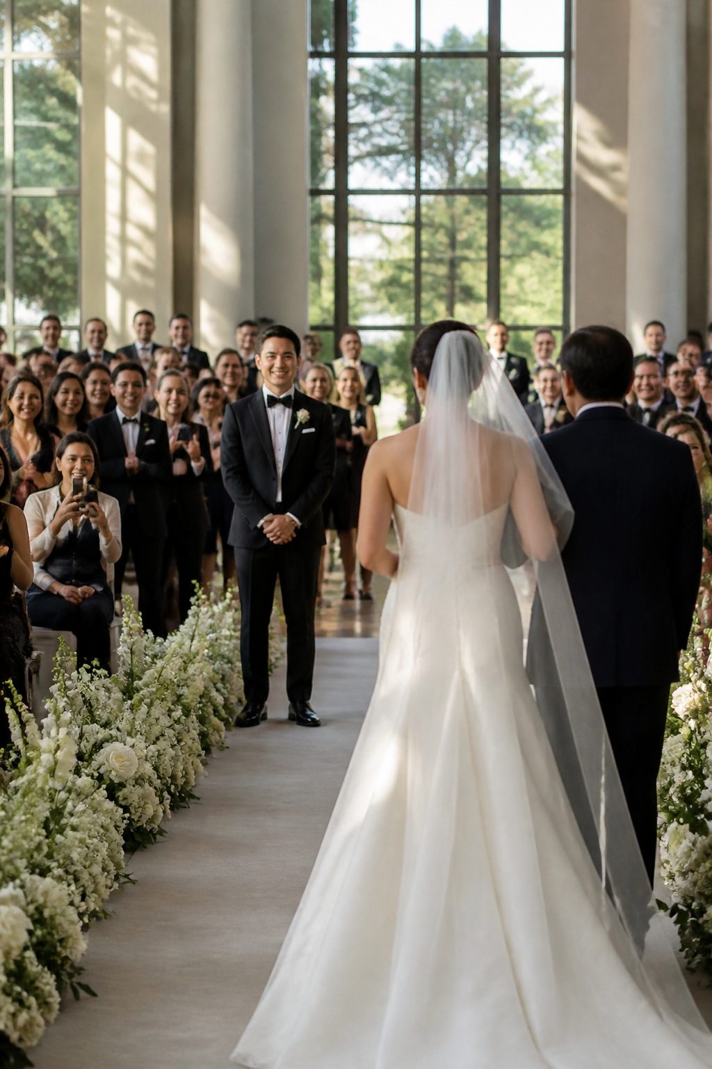 20 Wedding Photos Ideas for 2026 15 Couple walking down the aisle during the ceremony.